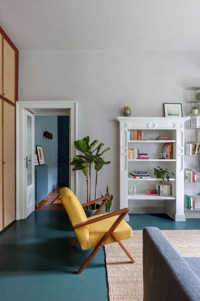Un petit et joli appartement avec un sol turquoise 6